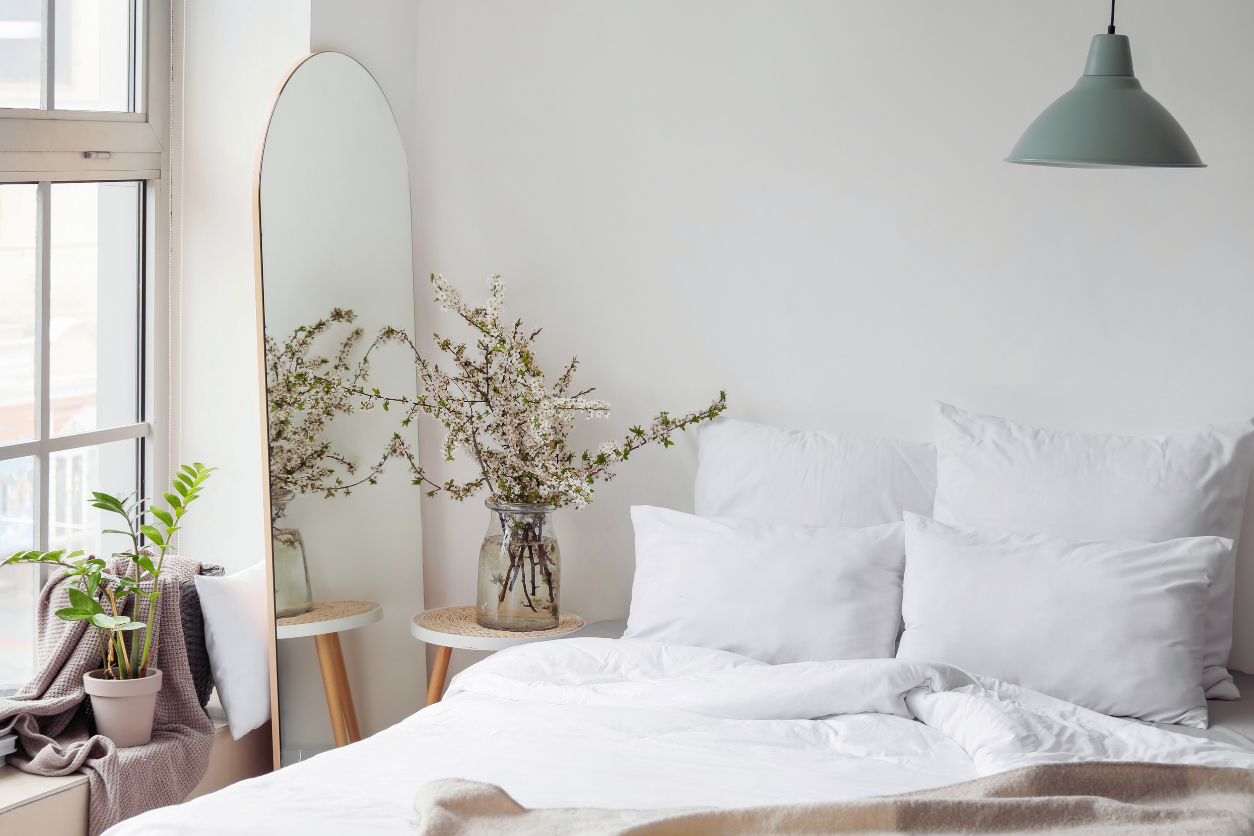 Bedroom with mirrors for an open feel