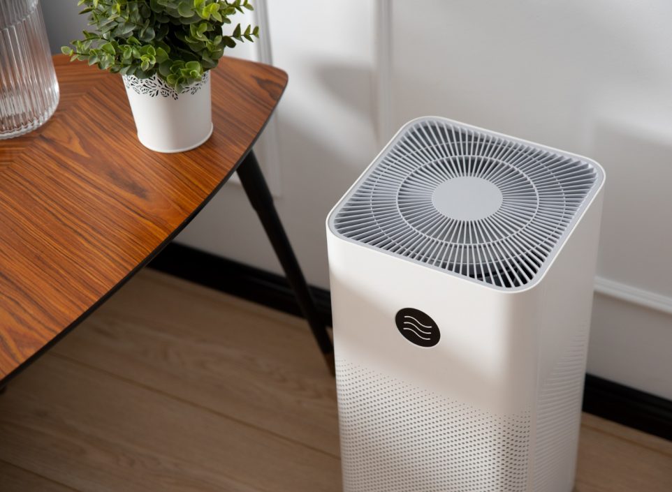 Indoor air purifier next to a table