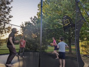 Whether it's doing tricks or throwing up a trick shot, a trampoline makes playtime all the more fun!